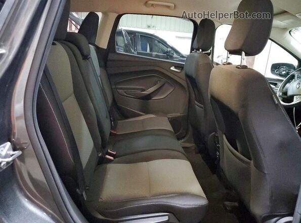 1FMCU9GD8JUB06877 2018 FORD ESCAPE Gray Vista interior trasera