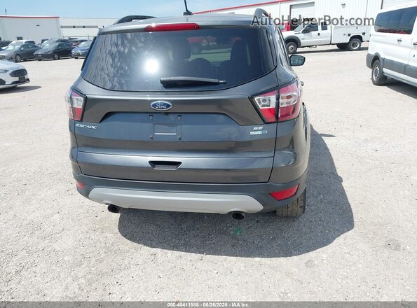 1FMCU9GD8JUD08537 2018 FORD ESCAPE Gray 