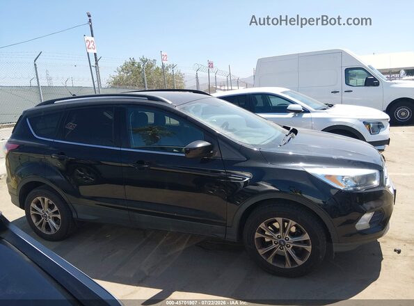 1FMCU9GD8JUD12457 2018 FORD ESCAPE Black Սալոնի հետևի տեսք
