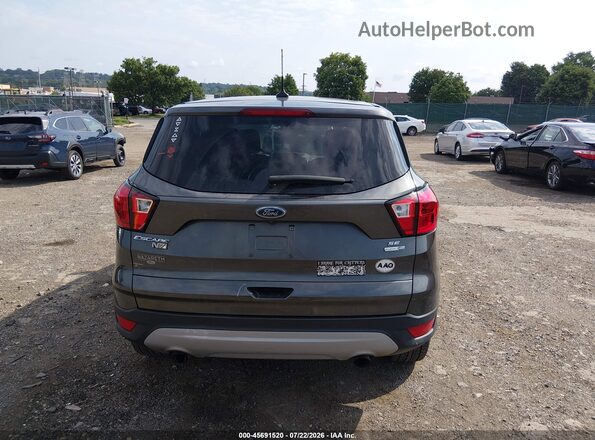 1FMCU9GD8KUA58296 2019 FORD ESCAPE Gray 