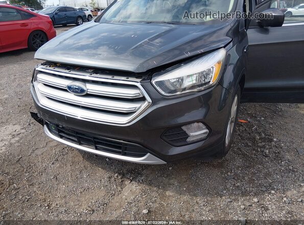 1FMCU9GD8KUA58296 2019 FORD ESCAPE Gray 