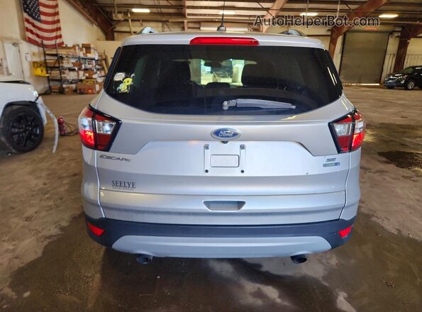 1FMCU9GDXJUB39704 2018 FORD ESCAPE Silver Rear view