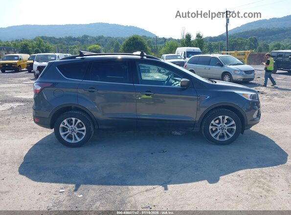 1FMCU9GDXJUC94091 2018 FORD ESCAPE Gray Widok wnętrza z tyłu