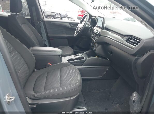 1FMCU9GN5PUB25680 2023 FORD ESCAPE Light Blue Вид салона спереди