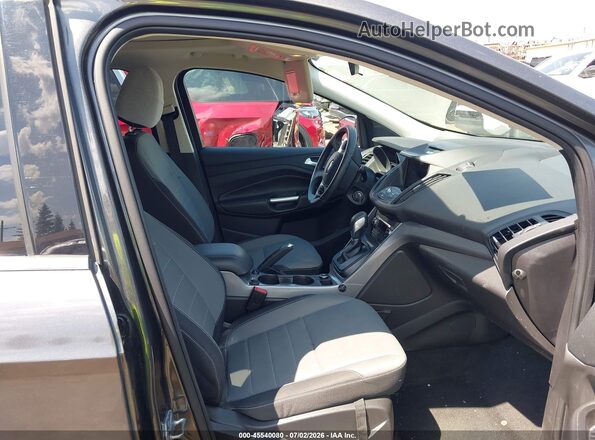 1FMCU9GX5GUB54839 2016 FORD ESCAPE Gray Front interior view