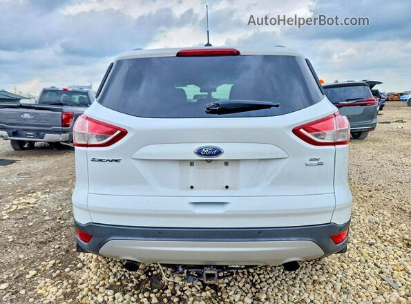 1FMCU9GX5GUB70572 2016 FORD ESCAPE White Rear view