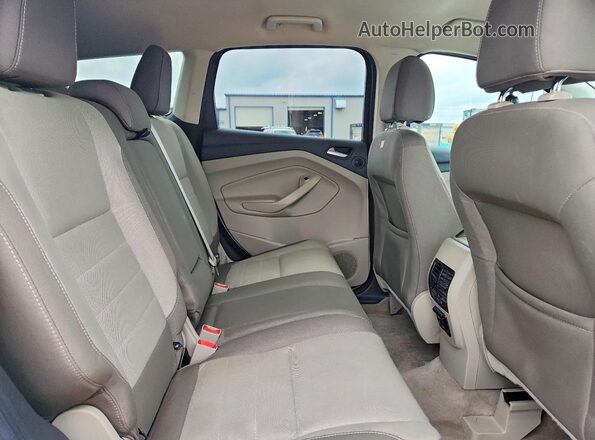 1FMCU9GX5GUB70572 2016 FORD ESCAPE White Rear interior view