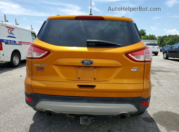1FMCU9GX5GUC00962 2016 FORD ESCAPE Orange Rear view
