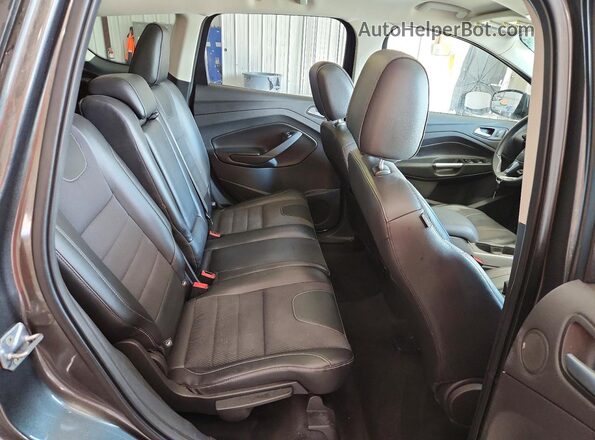 1FMCU9GX7GUB71884 2016 FORD ESCAPE Gray Vista de los asientos traseros