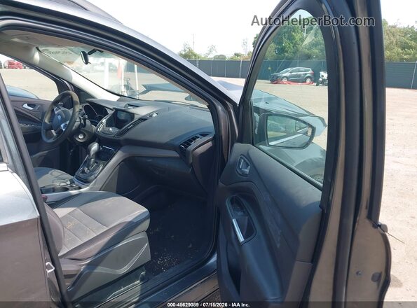 1FMCU9GX8GUC01569 2016 FORD ESCAPE Gray Вид салону спереду