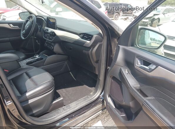 1FMCU9H63MUB04376 2021 FORD ESCAPE Черный Вид салона спереди