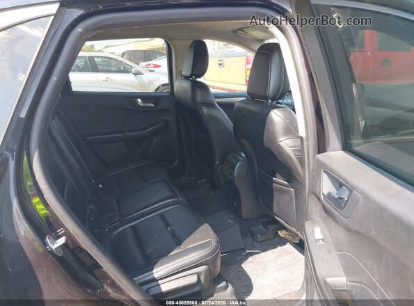 1FMCU9H67MUB23058 2021 FORD ESCAPE Black Vista de la etiqueta del VIN