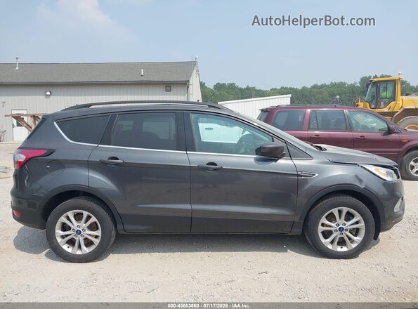 1FMCU9HD0JUB23591 2018 FORD ESCAPE Gray Rear interior view