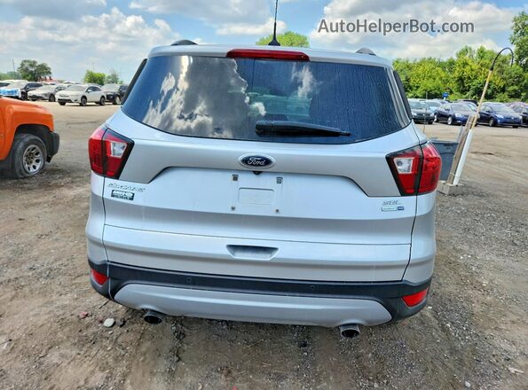 1FMCU9HD0KUB02869 2019 FORD ESCAPE Серебряный Вид сзади