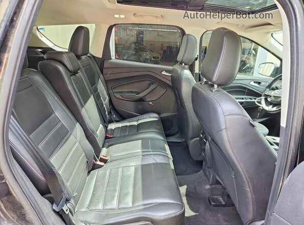 1FMCU9HD1JUD24934 2018 FORD ESCAPE Black Rear interior view