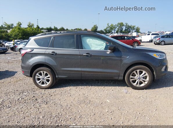 1FMCU9HD2JUB67592 2018 FORD ESCAPE Gray Widok wnętrza z tyłu