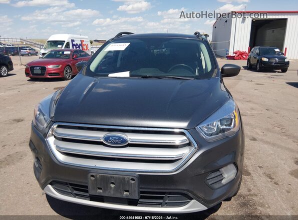 1FMCU9HD3JUB83851 2018 FORD ESCAPE Серый Вид щитка приборов
