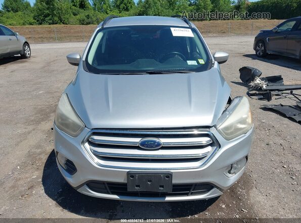 1FMCU9HD6JUA77801 2018 FORD ESCAPE Серебряный Вид задней части салона