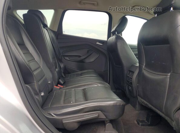 1FMCU9HD7JUC66540 2018 FORD ESCAPE Серебряный Вид задней части салона