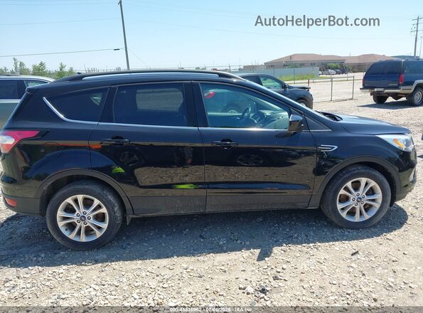 1FMCU9HD8JUA89237 2018 FORD ESCAPE Black Widok wnętrza z tyłu
