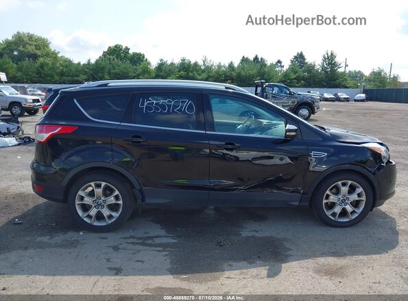 1FMCU9J90GUB22925 2016 FORD ESCAPE Black Widok wnętrza z tyłu