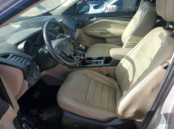 1FMCU9J90HUC56335 2017 FORD ESCAPE Silver Front interior view