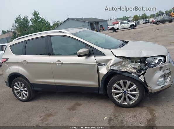 1FMCU9J94HUB65570 2017 FORD ESCAPE Champagne Սալոնի հետևի տեսք