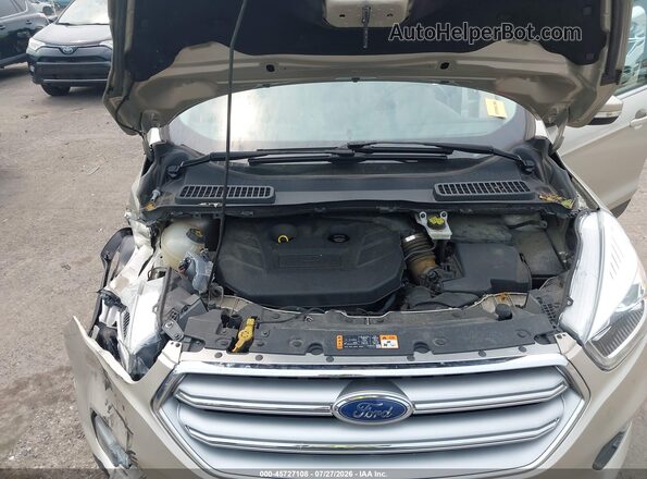 1FMCU9J94HUB65570 2017 FORD ESCAPE Champagne Հետևի տեսք