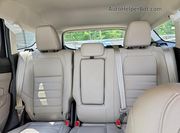1FMCU9J95JUD46747 2018 FORD ESCAPE White Vista de los asientos traseros