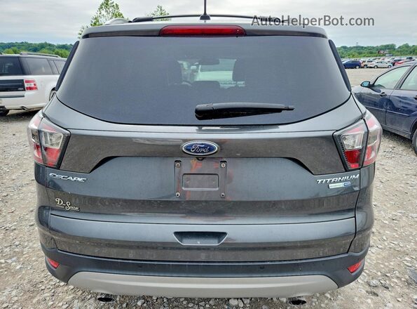 1FMCU9J96HUB08030 2017 FORD ESCAPE Серый Вид сзади