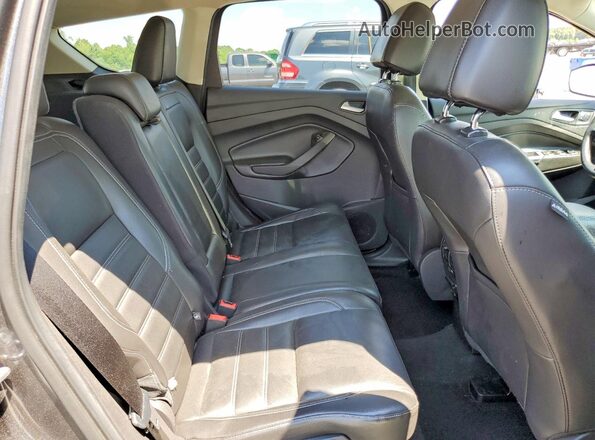 1FMCU9J98HUD56814 2017 FORD ESCAPE Gray Rear interior view