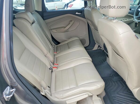 1FMCU9J9XGUA36604 2016 FORD ESCAPE Gray Rear interior view