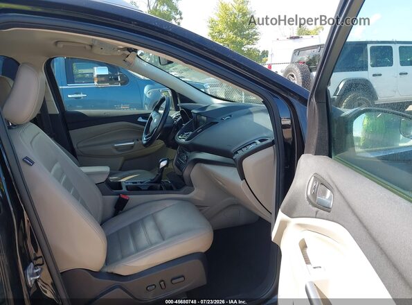 1FMCU9J9XKUC30560 2019 FORD ESCAPE Black Front interior view