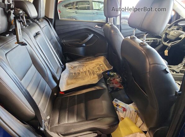 1FMCU9JD1HUA97961 2017 FORD ESCAPE Blue Rear interior view