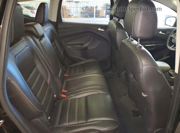 1FMCU9JD6HUB06282 2017 FORD ESCAPE Black Widok wnętrza z tyłu