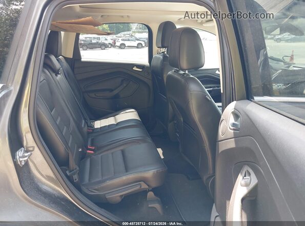 1FMCU9JDXHUD83744 2017 FORD ESCAPE Gray VIN კოდის სტიკერის ხედი