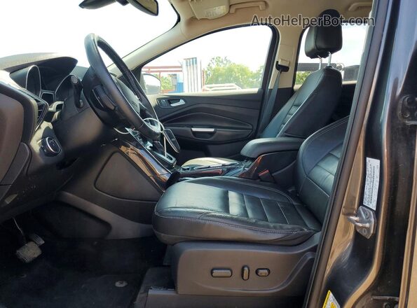 1FMCU9JX0GUA11256 2016 FORD ESCAPE Gray Widok wnętrza z przodu