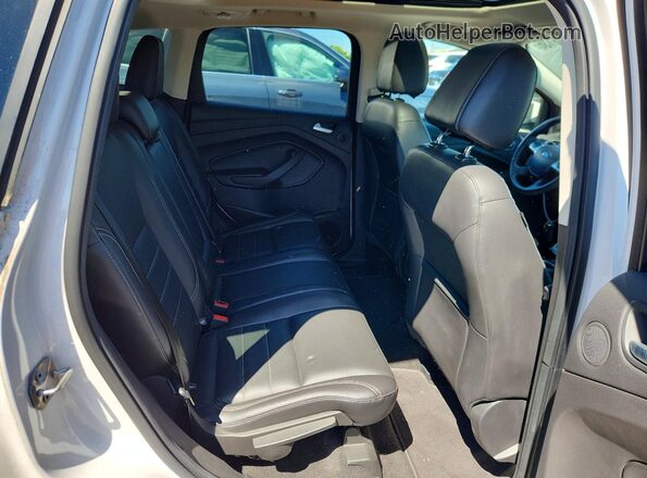 1FMCU9JX2GUC03875 2016 FORD ESCAPE White Widok wnętrza z tyłu