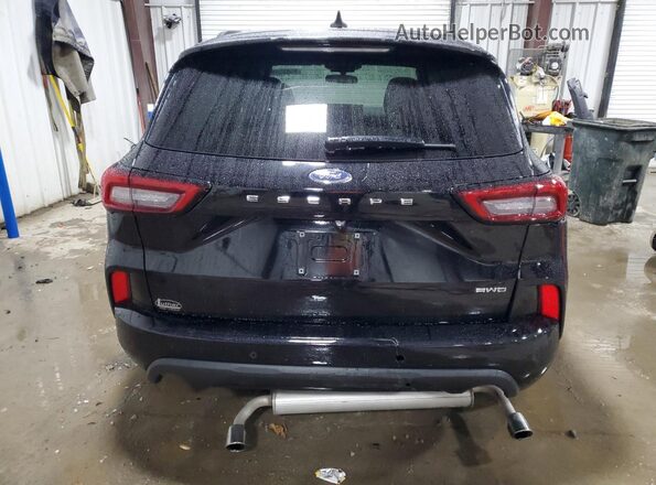 1FMCU9MN0RUB41759 2024 FORD ESCAPE Black Rear view