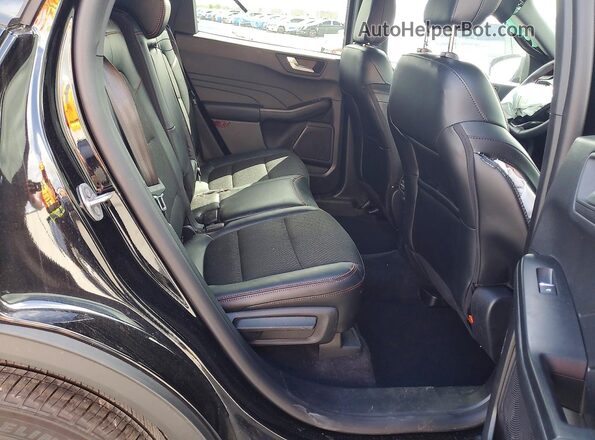1FMCU9NZ1TUA12583 2026 FORD ESCAPE Черный Вид задней части салона