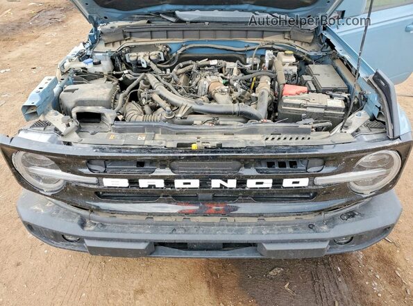 1FMDE5CP2PLC08636 2023 FORD BRONCO Blue Vista del compartimento del motor
