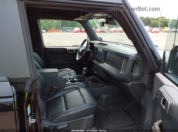 1FMEE7BH8SLB68663 2025 FORD BRONCO Черный Вид салона спереди