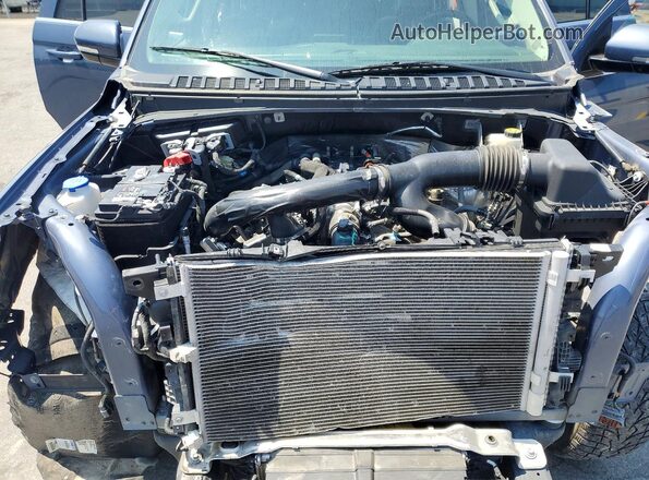 1FMJK1J89PEA07823 2023 FORD EXPEDITION Blue Vista del compartimento del motor