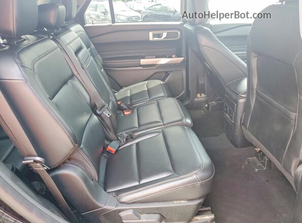 1FMSK7DH5RGA49027 2024 FORD EXPLORER Black Widok wnętrza z tyłu