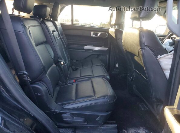 1FMSK8DH1PGA58035 2023 FORD EXPLORER Black Vista interior trasera
