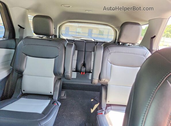 1FMSK8DH1RGA44722 2024 FORD EXPLORER Black Rear seats view