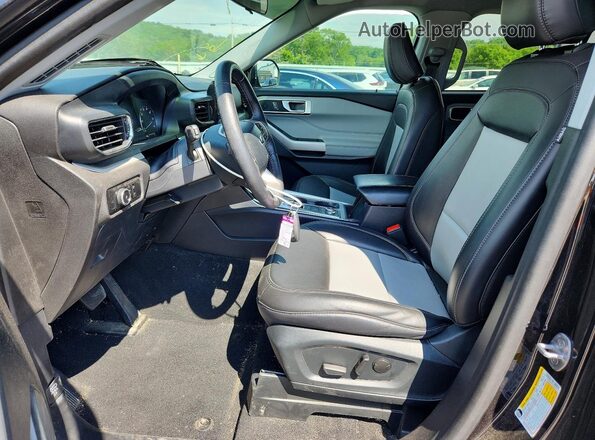 1FMSK8DH1RGA44722 2024 FORD EXPLORER Black Front interior view