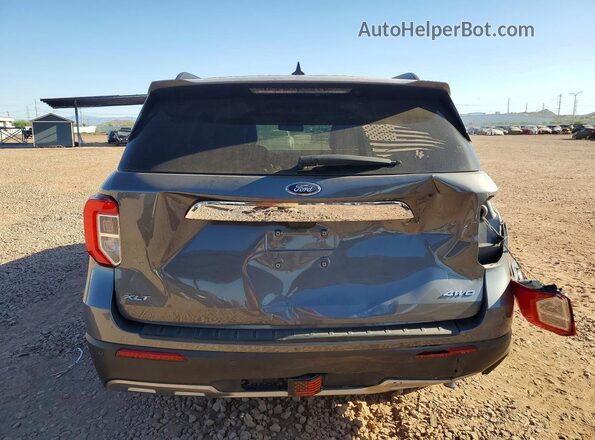 1FMSK8DH2RGA42011 2024 FORD EXPLORER Gray Vista trasera
