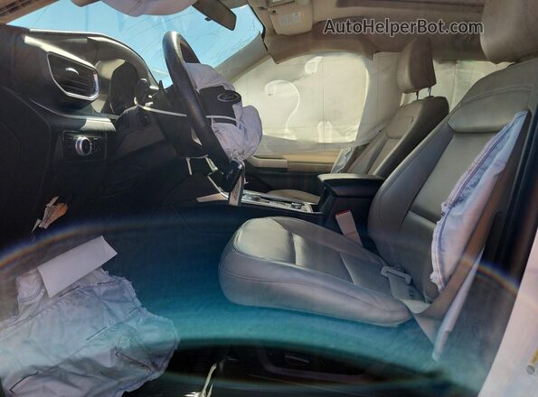 1FMSK8DH4MGC48262 2021 FORD EXPLORER White Widok wnętrza z przodu