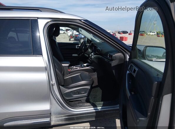1FMSK8DH7MGA50226 2021 FORD EXPLORER Серебряный Вид салона спереди